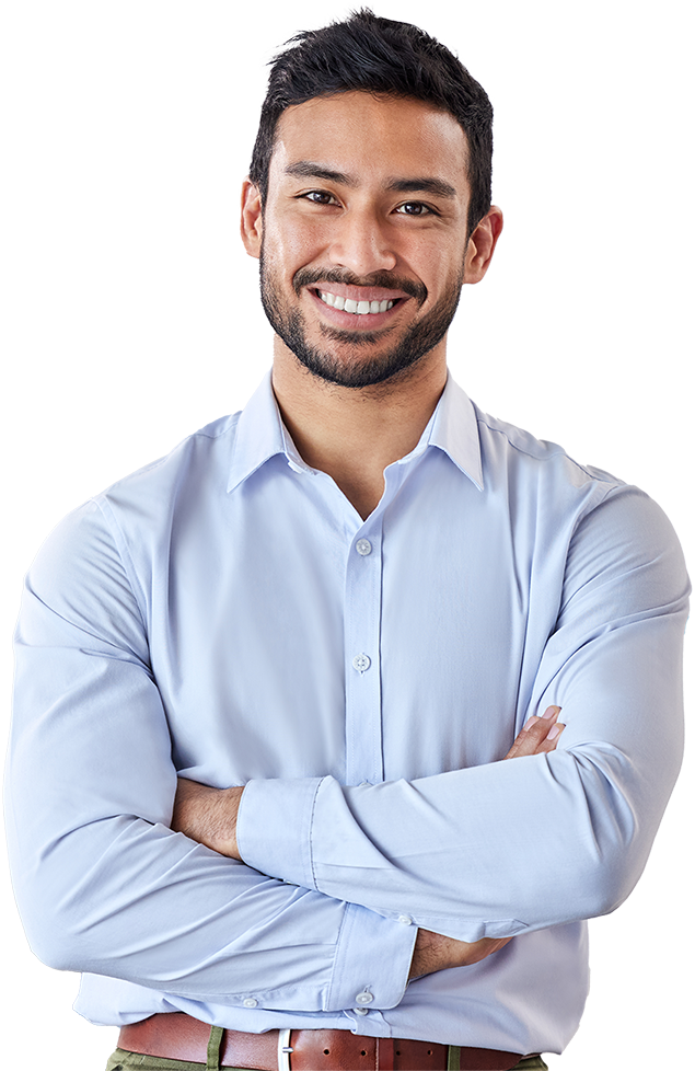 Smiling man dressed in business casual with arms crossed.